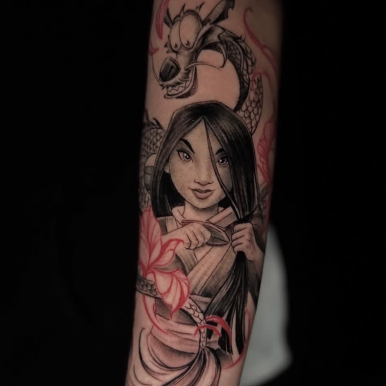 Mulan tattoo with dragon and red detailing