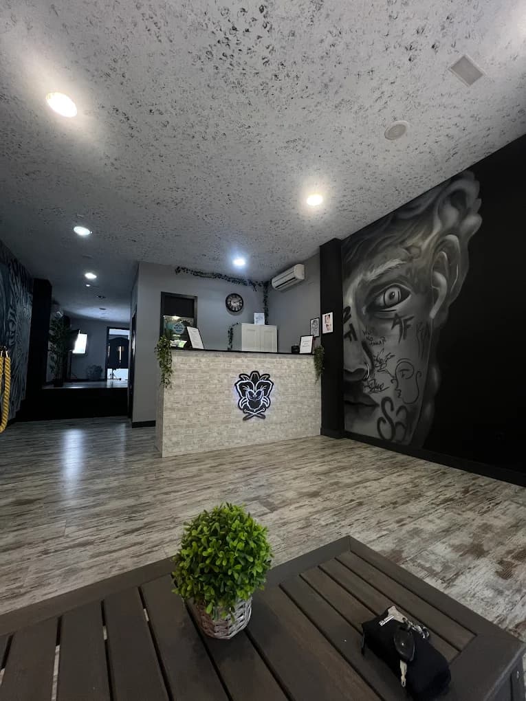 Inside Cattleya Tattoo studio with tattoo bed and natural light